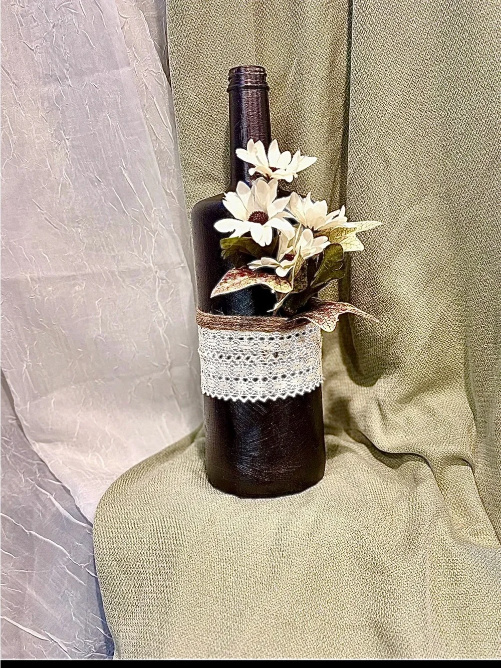 Handcrafted Black Bottle Vase with White Daisies and Lace Accent